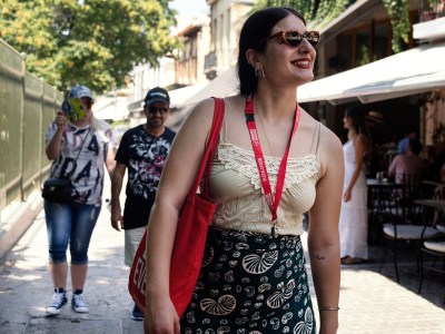 a person standing on a sidewalk